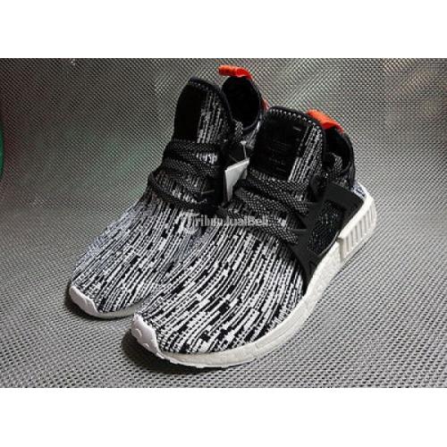 Sneakers Adidas NMD XR1 Glitch Camo White Core Black Solar Red di