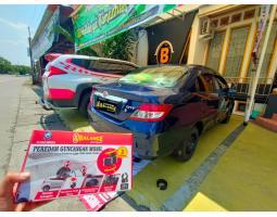 Mobil Travel Bebas Amblas Gasruk dengan Balance Peredam Guncangan Mobil - Bandar Lampung