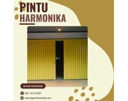 Pintu Logam Harmonika Dibuat dari Material yang Kokoh dan Tahan Lama - Nabire