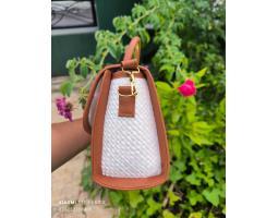 Tas Pesta Pandan Putih Vynil Coklat - Banjarmasin Kalimantan Selatan