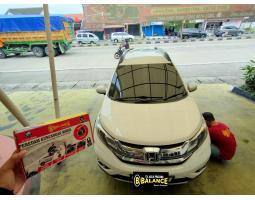 Balance Spring Buffer Solusi Tepat Mengatasi Mobil Gradak Gruduk di Jalan Rusak - Jambi 