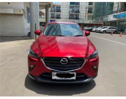 Mobil Mazda CX 3 Sport Tahun 2022 Warna Merah Plat Ganjil KM Rendah - Jakarta Barat 