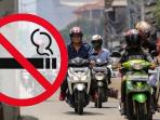 Pengendara Kena Denda, Bagaimana Aturan Hukum Bila Pembonceng yang Merokok?