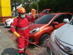 Cegah Virus Corona dengan Semprotkan Cairan Disinfektan Buat Cat Mobil Kusam? Begini Cara Atasinya