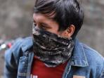 Masker Buff Justru Memperparah Penyebaran Virus Corona, Ini Penjelasan Ahli
