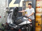 4 Langkah Perawatan Ekstra Vespa Matik di Musim Hujan