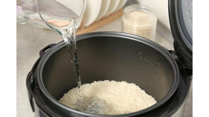 Ilustrasi Menggunakan Panci Rice Cooker dengan Benar agar Nasi Tidak Basi. (Kompas.com)