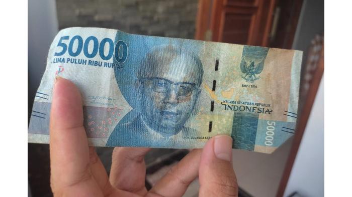 Ilustrasi Penukaran Uang Kertas yang Rusak. (Kompas.com)