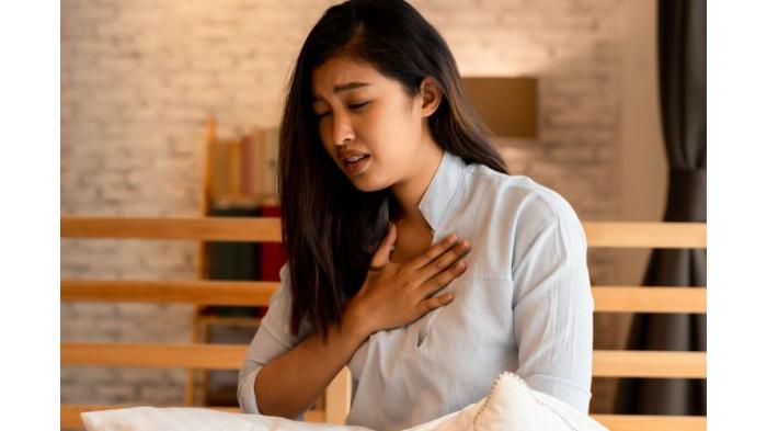 Ilustrasi mengatur napas saat terasa sakit kepala. (Shutterstock)