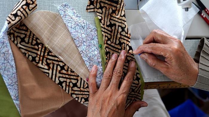 Ilustrasi potongan kain (kompas.id)