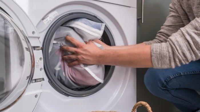 Mencuci vitrase | Tribunnews.com