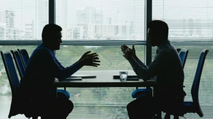 Ilustrasi Dua Orang yang sedang Bernegoisasi. (Kompas.com)
