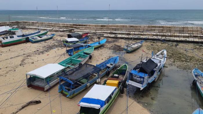 Ilustrasi Kehidupan di Pesisir Pantai. (Kompas.id)