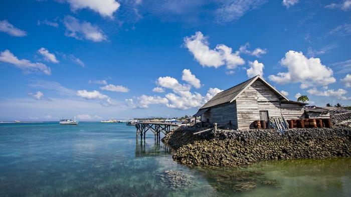 Ilustrasi Rumah yang Berada di Pesisir Pantai. (Regional Kompas)
