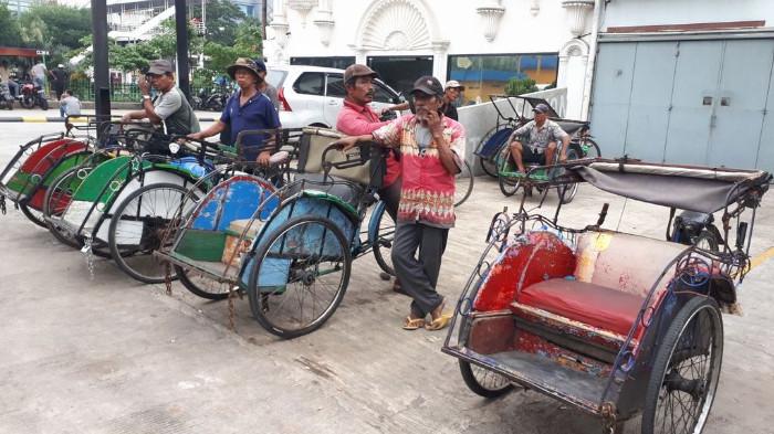 Ilustrasi Pangkalan Becak. (Kompas.id)