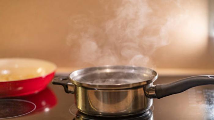 Menggunakan Air Panas