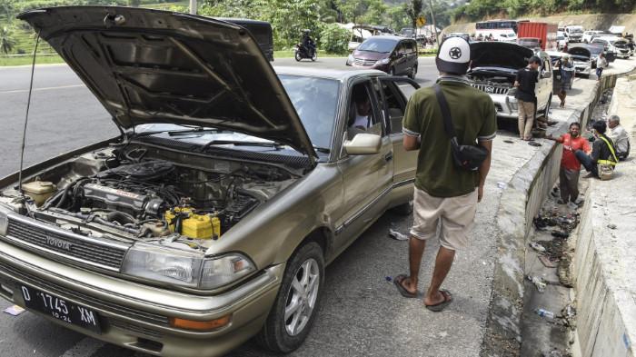 Ilustrasi Mobil Mengalami Mogok. (Kompas.com)