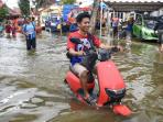 5 Langkah Merawat Motor Listrik Setelah Terobos Banjir