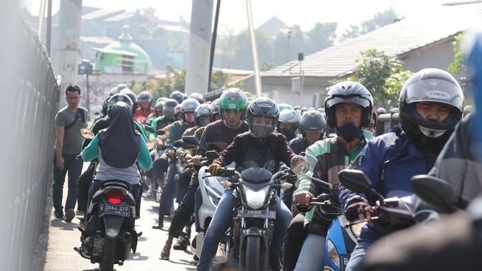 Ilustrasi berkendara di jalanan macet. (kompas.com)